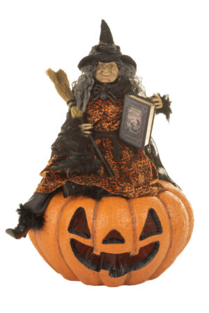 Sitting Orange and Black Flocked Vogue Witch Sitting on a Pumpkin